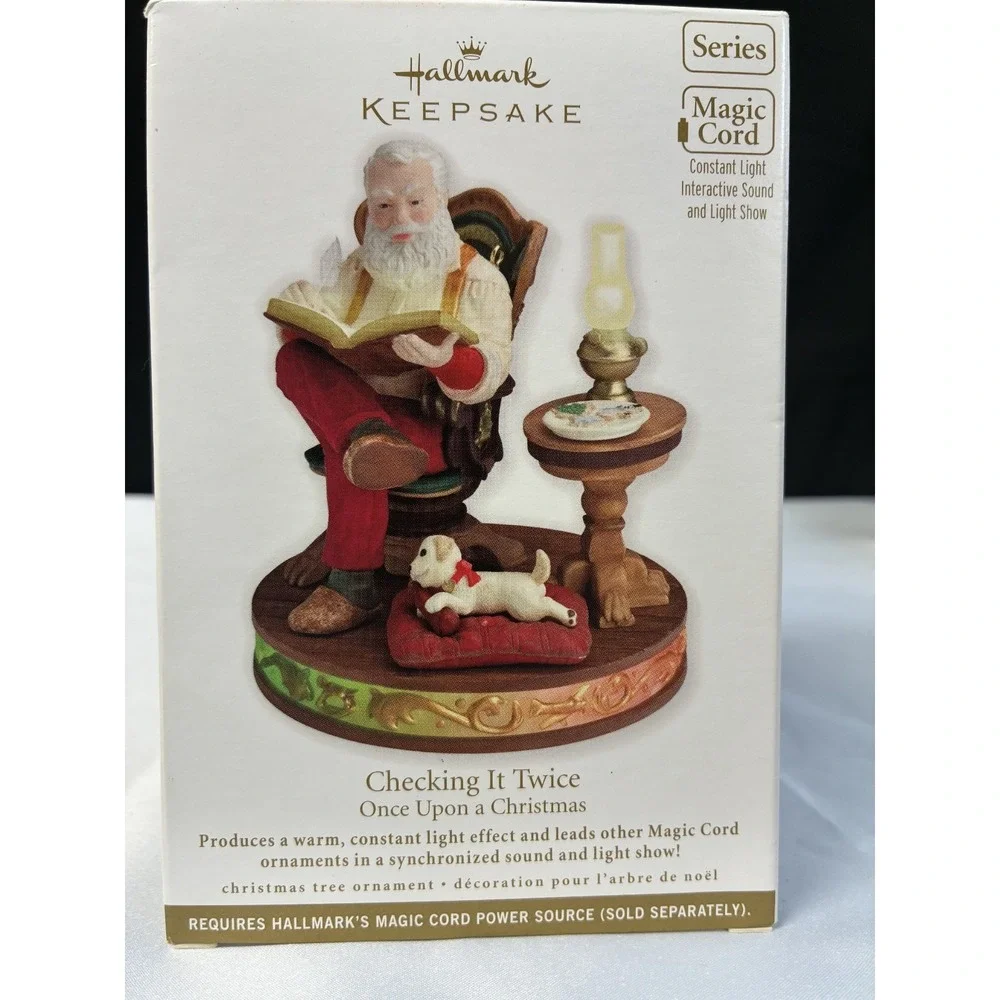 Hallmark Keepsake Magic Cord Checking It Twice Ornament 2011 Santa QX8929